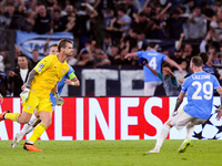 Ivan Provedel goalkeeper of SS Lazio celebrates scoring his side first goal during the UEFA Champions League Group E match between SS Lazio...