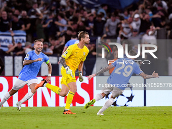 Ivan Provedel goalkeeper of SS Lazio celebrates scoring his side first goal during the UEFA Champions League Group E match between SS Lazio...