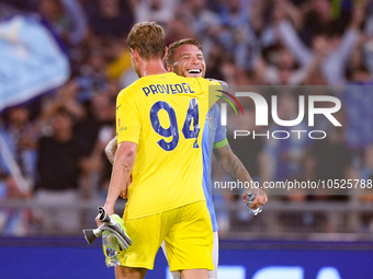 Ivan Provedel of SS Lazio celebrates with Ciro Immobile of SS Lazio at the end of the the UEFA Champions League Group E match between SS Laz...