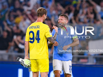 Ivan Provedel of SS Lazio celebrates with Ciro Immobile of SS Lazio at the end of the the UEFA Champions League Group E match between SS Laz...