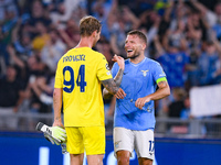 Ivan Provedel of SS Lazio celebrates with Ciro Immobile of SS Lazio at the end of the the UEFA Champions League Group E match between SS Laz...