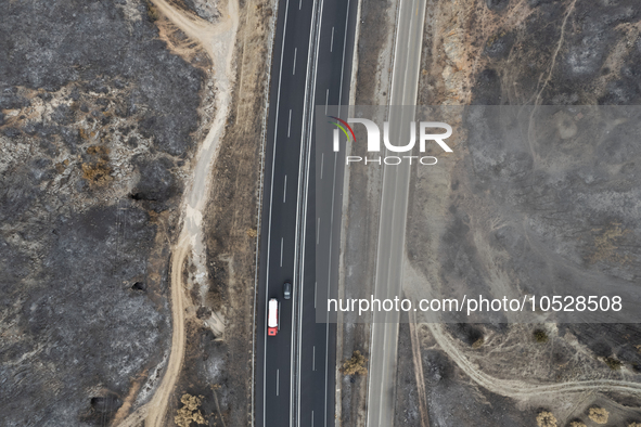 A drone image shows a view of the burned areas of land between the Dadia forest and the villages of Kirkis and Sykorrachis, Alexandroupolis,...