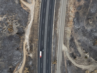 A drone image shows a view of the burned areas of land between the Dadia forest and the villages of Kirkis and Sykorrachis, Alexandroupolis,...