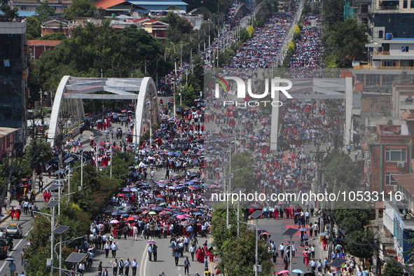 Thousands of public school teachers from all over Nepal march towards the parliament during a protest against a new school bill which will e...