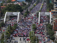 Thousands of public school teachers from all over Nepal march towards the parliament during a protest against a new school bill which will e...