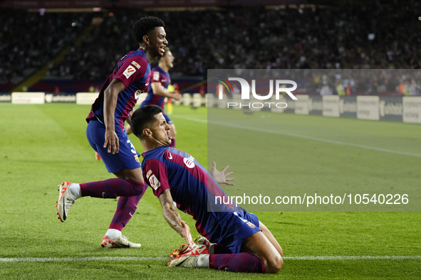 Joao Cancelo right-back of Barcelona and Portugal celebrates after scoring his sides first goal during the LaLiga EA Sports match between FC...