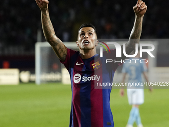 Joao Cancelo right-back of Barcelona and Portugal celebrates after scoring his sides first goal during the LaLiga EA Sports match between FC...