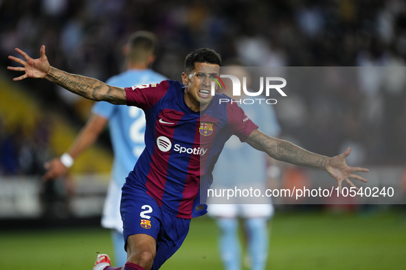 Joao Cancelo right-back of Barcelona and Portugal celebrates after scoring his sides first goal during the LaLiga EA Sports match between FC...