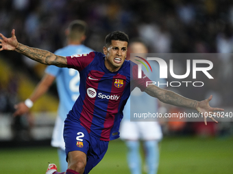 Joao Cancelo right-back of Barcelona and Portugal celebrates after scoring his sides first goal during the LaLiga EA Sports match between FC...