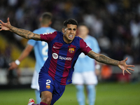 Joao Cancelo right-back of Barcelona and Portugal celebrates after scoring his sides first goal during the LaLiga EA Sports match between FC...