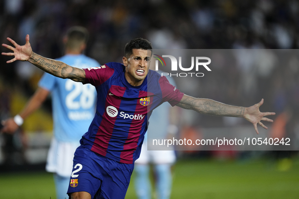 Joao Cancelo right-back of Barcelona and Portugal celebrates after scoring his sides first goal during the LaLiga EA Sports match between FC...