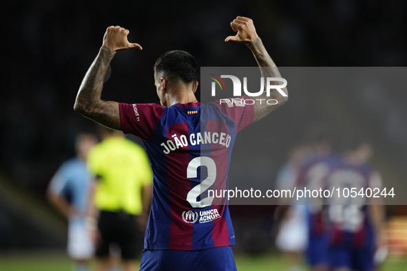 Joao Cancelo right-back of Barcelona and Portugal celebrates after scoring his sides first goal during the LaLiga EA Sports match between FC...