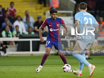 Lamine Yamal right winger of Barcelona and Spain in action during the LaLiga EA Sports match between FC Barcelona and Celta Vigo at Estadi O...