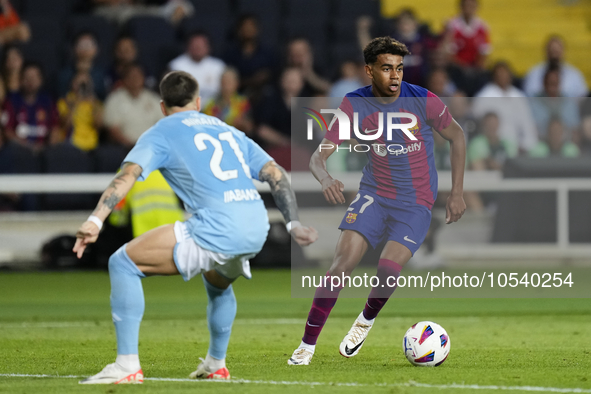 Lamine Yamal right winger of Barcelona and Spain in action during the LaLiga EA Sports match between FC Barcelona and Celta Vigo at Estadi O...