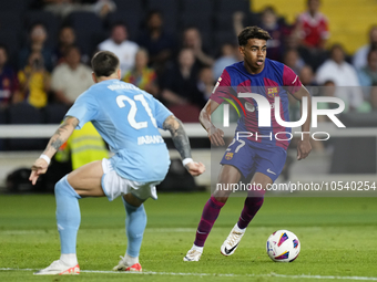 Lamine Yamal right winger of Barcelona and Spain in action during the LaLiga EA Sports match between FC Barcelona and Celta Vigo at Estadi O...