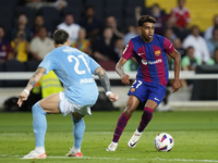 Lamine Yamal right winger of Barcelona and Spain in action during the LaLiga EA Sports match between FC Barcelona and Celta Vigo at Estadi O...