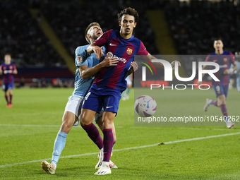 Ferran Torres left winger of Barcelona and Spain and Unai Nuñez centre-Back of Celta de Vigo and Spain compete for the ball during the LaLig...