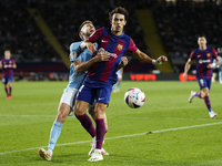 Ferran Torres left winger of Barcelona and Spain and Unai Nuñez centre-Back of Celta de Vigo and Spain compete for the ball during the LaLig...