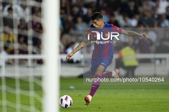 Joao Cancelo right-back of Barcelona and Portugal shooting to goal during the LaLiga EA Sports match between FC Barcelona and Celta Vigo at...