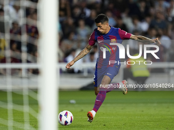 Joao Cancelo right-back of Barcelona and Portugal shooting to goal during the LaLiga EA Sports match between FC Barcelona and Celta Vigo at...