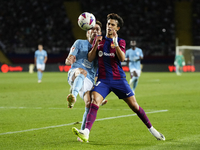 Ferran Torres left winger of Barcelona and Spain and Unai Nuñez centre-Back of Celta de Vigo and Spain compete for the ball during the LaLig...