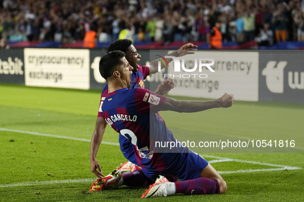 Joao Cancelo right-back of Barcelona and Portugal celebrates after scoring his sides first goal during the LaLiga EA Sports match between FC...