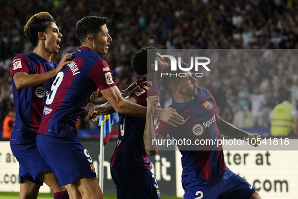 Joao Cancelo right-back of Barcelona and Portugal celebrates after scoring his sides first goal during the LaLiga EA Sports match between FC...