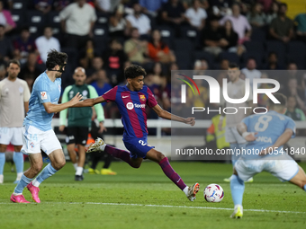 Lamine Yamal right winger of Barcelona and Spain does passed during the LaLiga EA Sports match between FC Barcelona and Celta Vigo at Estadi...