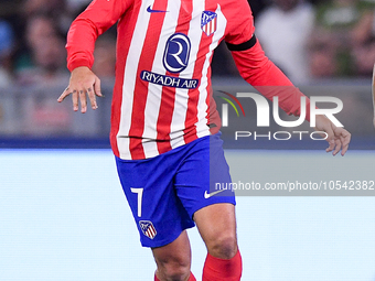 Antoine Griezmann of Atletico de Madrid Jose' Machin Dicombo of AC Monza during the UEFA Champions League Group E match between SS Lazio v A...