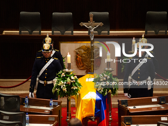 Colombian police and presidential guards guard as the late Colombian artist Fernando Botero lies inside the National Congress during his wak...