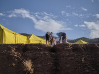 In Ouirgane, Morocco, on September 14, 2023, a tented camp is being set up to accommodate earthquake victims whose rural homes have collapse...