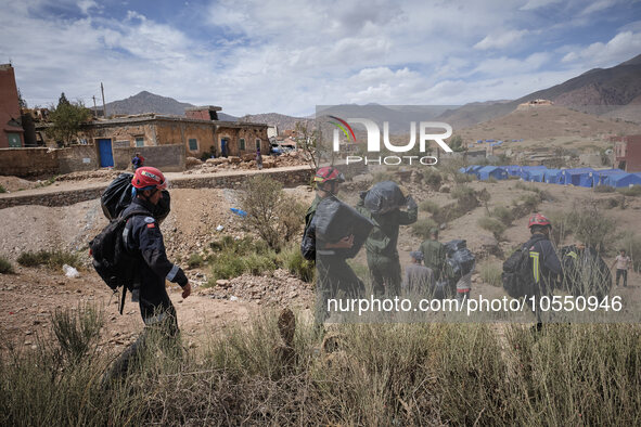 Morocco, Talat N'Yaaqoub, 2023-09-14. A Moroccan rescue operation team prepares to intervene in a hamlet near Talat N'Yaaqoub. 