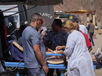 Morocco, Talat N'Yaaqoub, 2023-09-13. A car park has been requisitioned in the village of Talat N'Yaaqoub so that ambulances can park and pr...