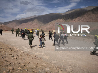 Morocco, Talat N'Yaaqoub, 2023-09-14. A Moroccan rescue operation team prepares to intervene in a hamlet near Talat N'Yaaqoub. (