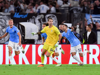 Ivan Provedel of SS Lazio celebrates with teammates after scoring the team's first goal to equalise  during the UEFA Champions League Group...