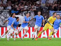 Ivan Provedel of SS Lazio celebrates with teammates after scoring the team's first goal to equalise  during the UEFA Champions League Group...