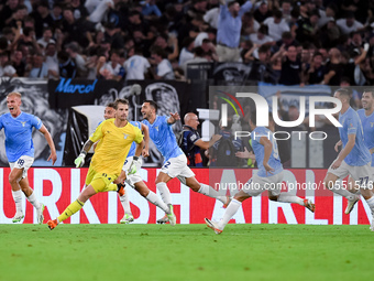 Ivan Provedel of SS Lazio celebrates with teammates after scoring the team's first goal to equalise  during the UEFA Champions League Group...