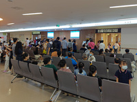 Patients line up for an emergency pre-check at the new pediatric building of Xinhua Hospital in Shanghai, China, On the night of September 2...