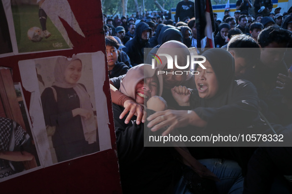 Some of family members of a tragedy victim was hysterical at the 13th gate of the stadium during a prayer commemorating the 1st anniversary...