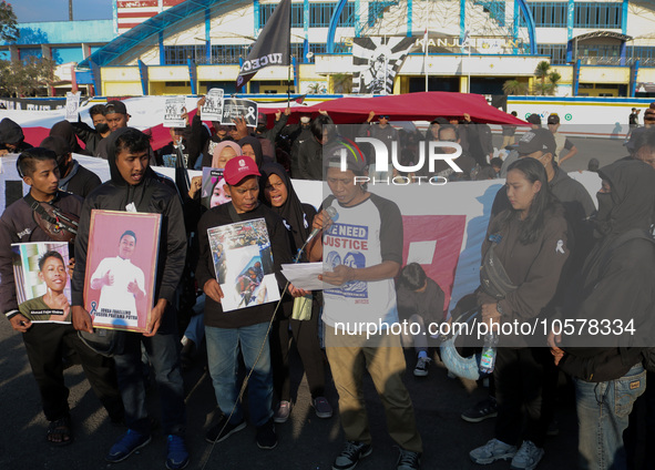 Hundreds of family members of the Kanjuruhan tragedy victims are reading demands for legal justice to the Indonesian government in front of...