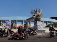 Thousands of Arema FC supporters convoyed in front of a lion statue (Arema Club football mascot), during the 1st anniversary of the Kanjuruh...