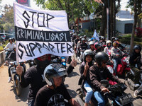 Thousands of Arema FC supporters convoy on the streets, during the 1st anniversary of the Kanjuruhan tragedy which killed 135 football suppo...