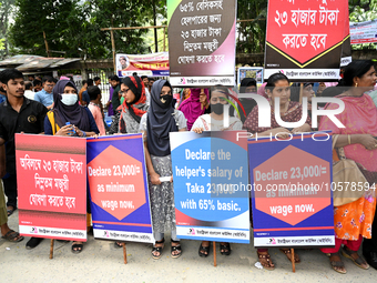 Activists of IndustriALL Bangladesh Council held a protest rally to demanding an increase in the minimum wages for garment workers, in Dhaka...