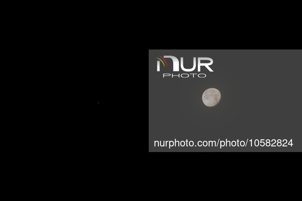 Conjunction between Moon and Jupiter planet is seen from L'Aquila, Italy, on October 1st, 2023. Jupiter and the Moon appeared to be very clo...