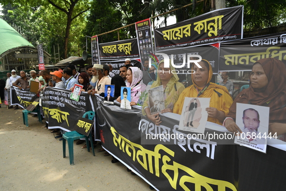 'Mayer Kanna', a platform of families of the army and air force members who faced mass-execution in 1977, stage a protest rally with their r...