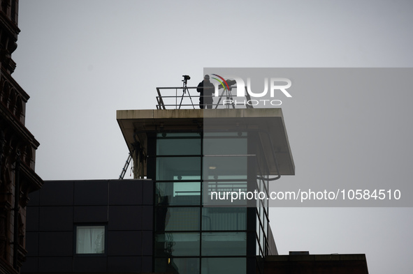 A police marksman looks in deep concentration during the Conservative Party Conference at Manchester Central Convention Complex, Manchester...