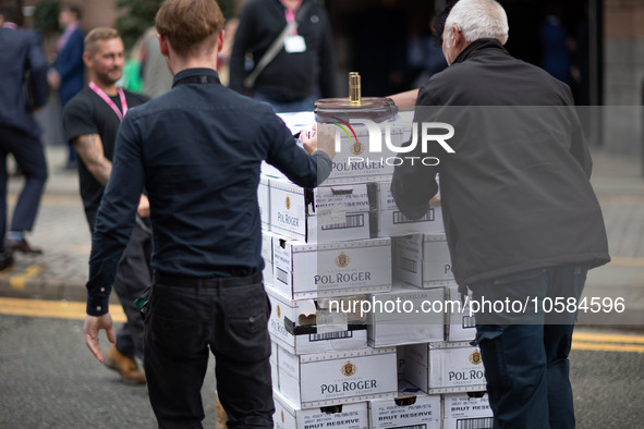 Another crate of Champagne Pol Roger - favoured by Winston Churchill - is wheeled into the Midland Hotel during the Conservative Party Confe...