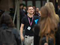 Owen Jones accosts delegates during the Conservative Party Conference at Manchester Central Convention Complex, Manchester on Monday 2nd Oct...