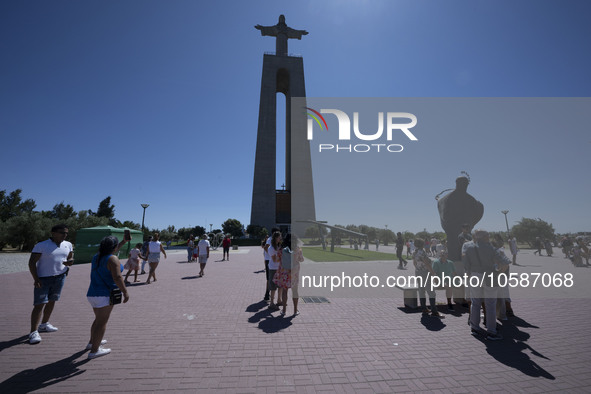 Several tourists are seen walking around the vicinity of the monument of Christ the King, in Almada, Lisbon. 04 September 2023. The National...