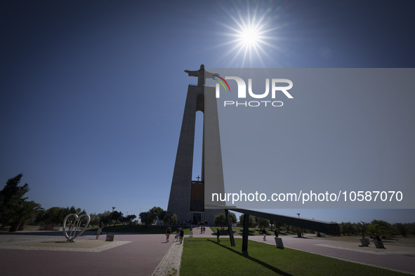 Several tourists are seen walking around the vicinity of the monument of Christ the King, in Almada, Lisbon. 04 September 2023. The National...